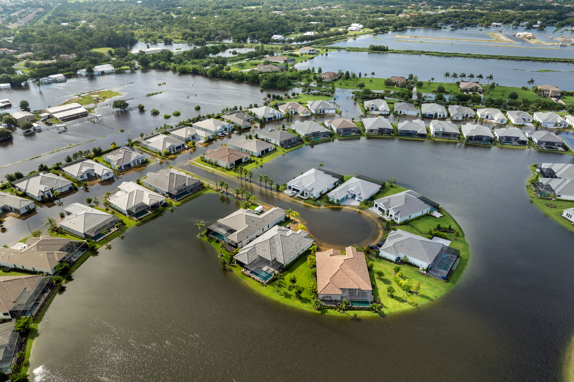 Tropical rainstorm flooded residential homes in suburban community in Florida. Hurricane aftermath.
